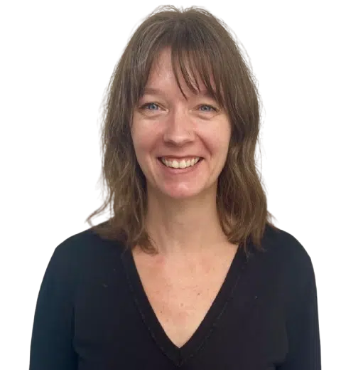Smiling woman with dark hair, black shirt.